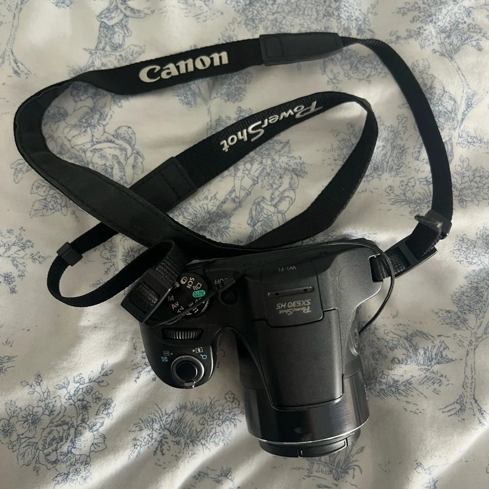 Canon Black Digital Camera with Strap